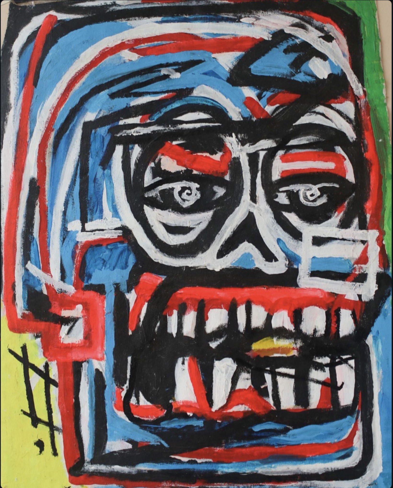 Bold red, white, blue and black face painting